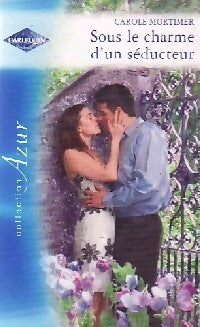 Sous le charme d'un séducteur - Carole Mortimer, Marie-Pierre Malfait - Livre